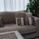 Living room display with beige Ayatul Kursi wall art
