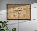 Close-up of ornate Arabic calligraphy on vintage Islamic wall decor