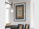 Vintage Islamic wall art displayed in a living room