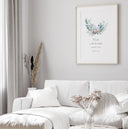 Framed Quran quote poster on white wall