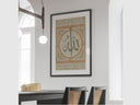 Close-up of Arabic calligraphy script in gold tones