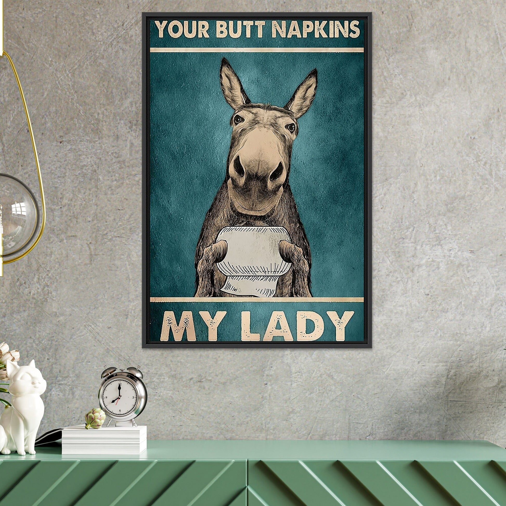 Bathroom wall decor featuring donkey art