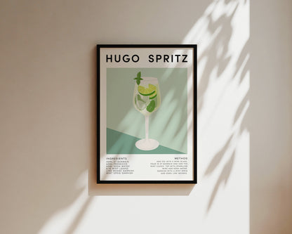 Flat lay of Hugo Spritz print with oranges and herbs