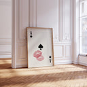 Close-up of Kiss Lips and Ace of Spades on retro background