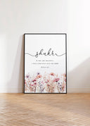 Lifestyle shot displaying the three framed wall art pieces in a living room setup