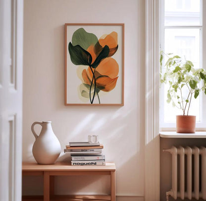 Two botanical art prints displayed together on a living room wall