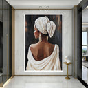 African beauty canvas art displayed in a modern living room