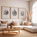 Living room setup with triple-panel Islamic wall art