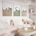 Living room wall display showing three Islamic posters on a single surface
