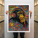 Ready-to-hang wall art display featuring chimp pop art