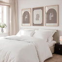 Modern living room display showing the minimalist Islamic art trio in a neutral color palette