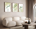 Three framed wall art prints on a gallery wall