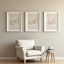 Three-panel wall art set arranged on light wall in minimalist style