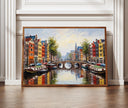 Amsterdam canal wall art featuring colorful Dutch houses in a textured oil-painting style