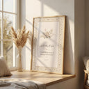Close-up of Arabic script Quran 55:13 with soft floral accents