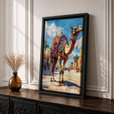 Framed camel art displayed in a cozy living space with rustic wood frame