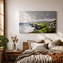 Living room with framed Irish coast wall art on wall