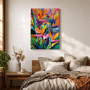 Wall arrangement with tropical leaves and Bird of Paradise artwork