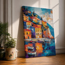 Framed canvas wall art of an Italian coastal village with a Mediterranean harbor